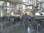 Low temperature concentration evaporator with organic solvent recovery