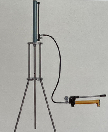 Manual oil pump column loader