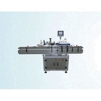 Automatic vertical self adhesive labeling machine