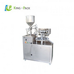 Unguent cream tube filling sealing machine