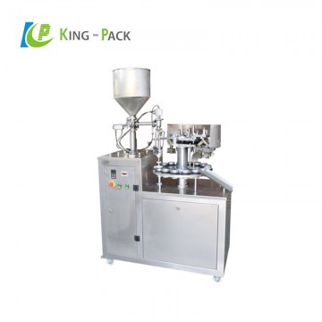 Unguent cream tube filling sealing machine