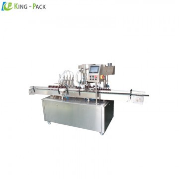 Liquid filling and capping machine