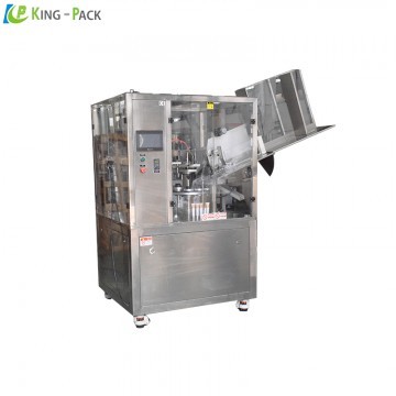 Automatic tube filling and sealing machine