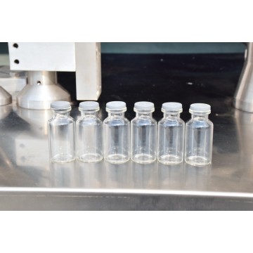 Medical glass vial filling and capping machine  