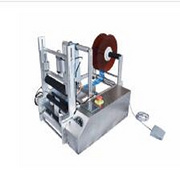 Semi-automatic double-label round bottle labeling machine